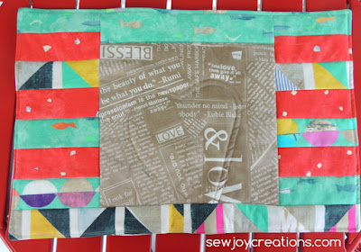Striped Delight placemat in Story fabric