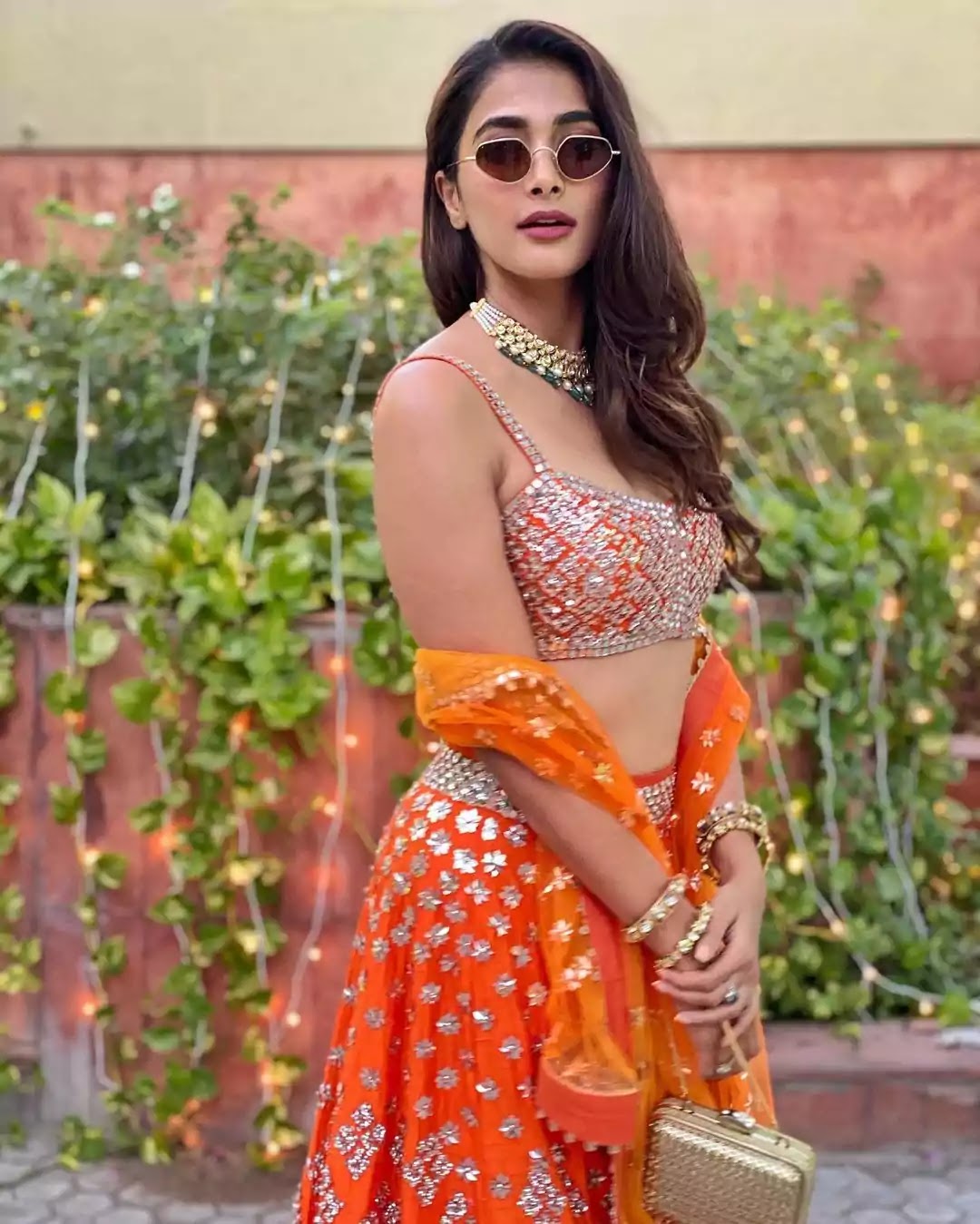 pooja-hegde-in-orange-lehenga pooja-hegde-in-orange-lehenga