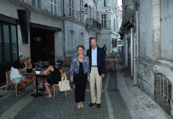 Grand Duchess Maria Teresa wore Emilio Pucci printed silk crepe de chine blazer azure in blue and black trousers