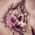 Skull and pinkish rose design tattoo