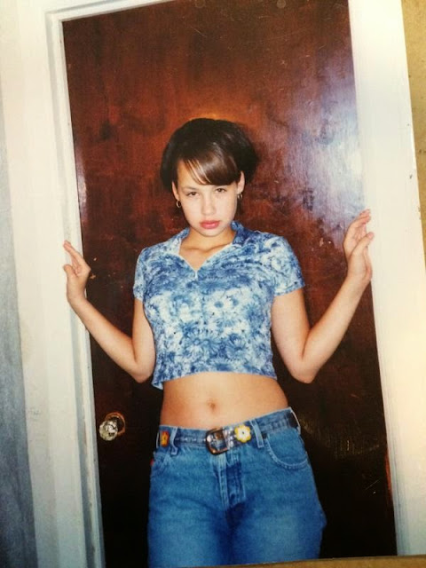 Do you recognize Amber Rose as a young Girl in throw back pic?