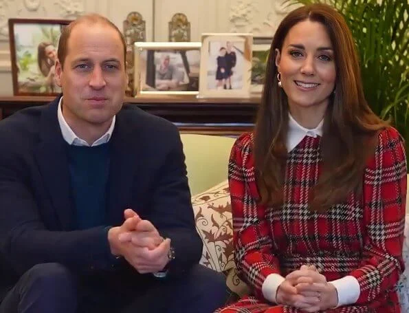 Kate Middleton wore red tartan pleated midi dress by Emilia Wickstead and pearl earrings from Simone Rocha