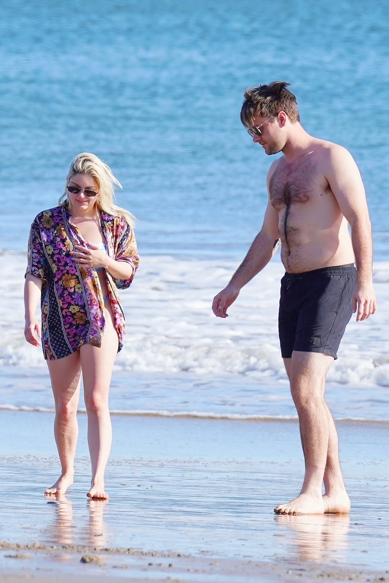 Ariel Winter stuns her bottom in a tie-dye bikini with Luke Benward at Santa Barbara