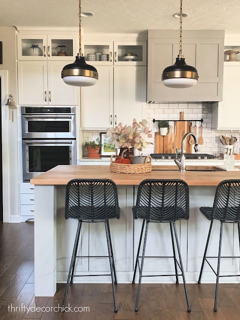 white kitchen with gray island