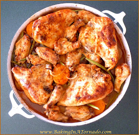 One Pot Chicken Dinner: Chicken pieces of your choice, veggies and potoes cook in one pot in the oven for an easy and flavorful dinner | Recipe developed by www.BakingInATornado.com | #recipe #dinner