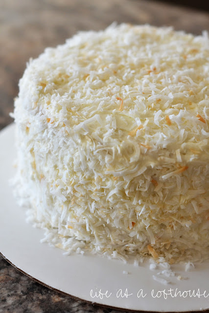 This Coconut Cream Cake with Cream Cheese Frosting is a delicious, moist cake with two cake layers covered in a silky smooth frosting. Life-in-the-Lofthouse.com