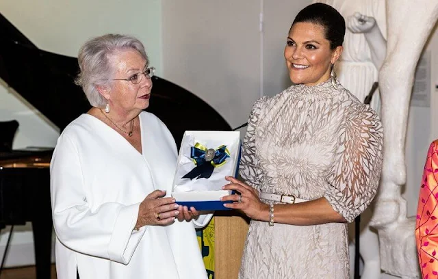 Crown Princess Victoria wore a new leaf patterned midi dress by Valerie. Princess Christina. Kreuger Jewellery feather earrings