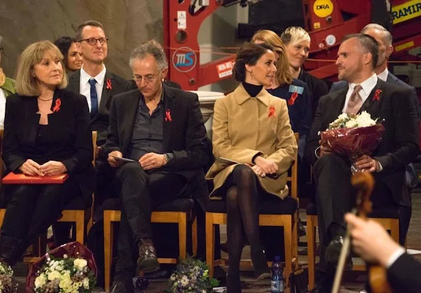 Princess Marie of Denmark attended the Danish AIDS Foundation's Annual Christmas concert at Trinity Church. Princess Marie wore Miu Miu coat