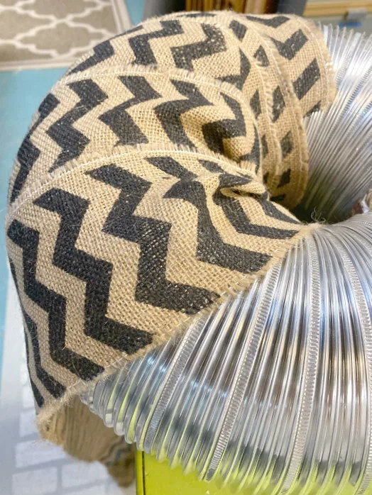 Wrapping the ductwork with chevron burlap
