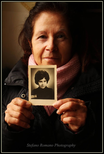 Aldina with her photograph at thirteen. Rome – 29 January 2021