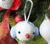 http://www.ravelry.com/patterns/library/snowman-ornament-14