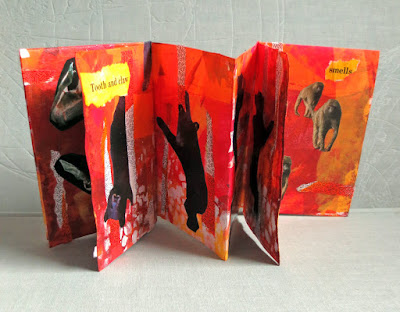 handmade folded collaged book about animals