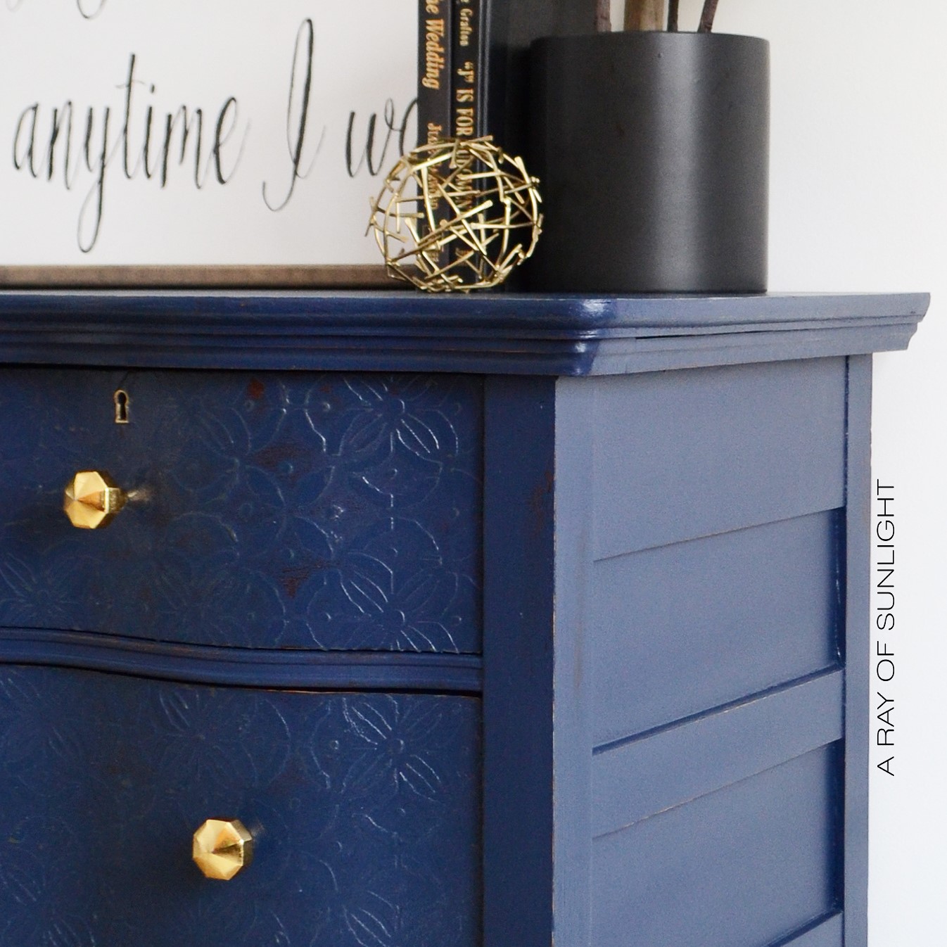 A Ray Of Sunlight: Navy Serpentine Dresser With Gold Knobs Navy Blue Antique Serpentine Dresser with Embossed Drawers and Gold Geometric Knobs - Painted in Country - A Ray Of Sunlight: Navy Serpentine Dresser With Gold Knobs