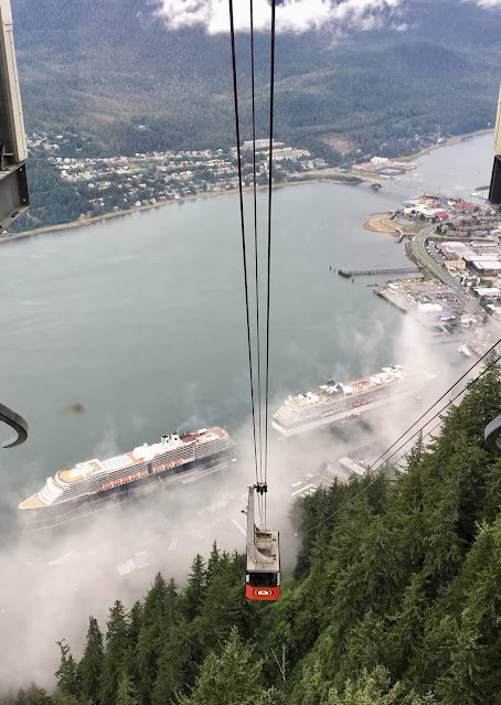 Aerial view of four cruise ships including Celebrity Cruises ship, in Juneau Alaska