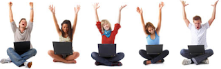 Five people sitting down with their arms in the air and a laptop in the laps.