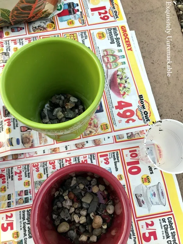 Adding Stones For Drainage to pots