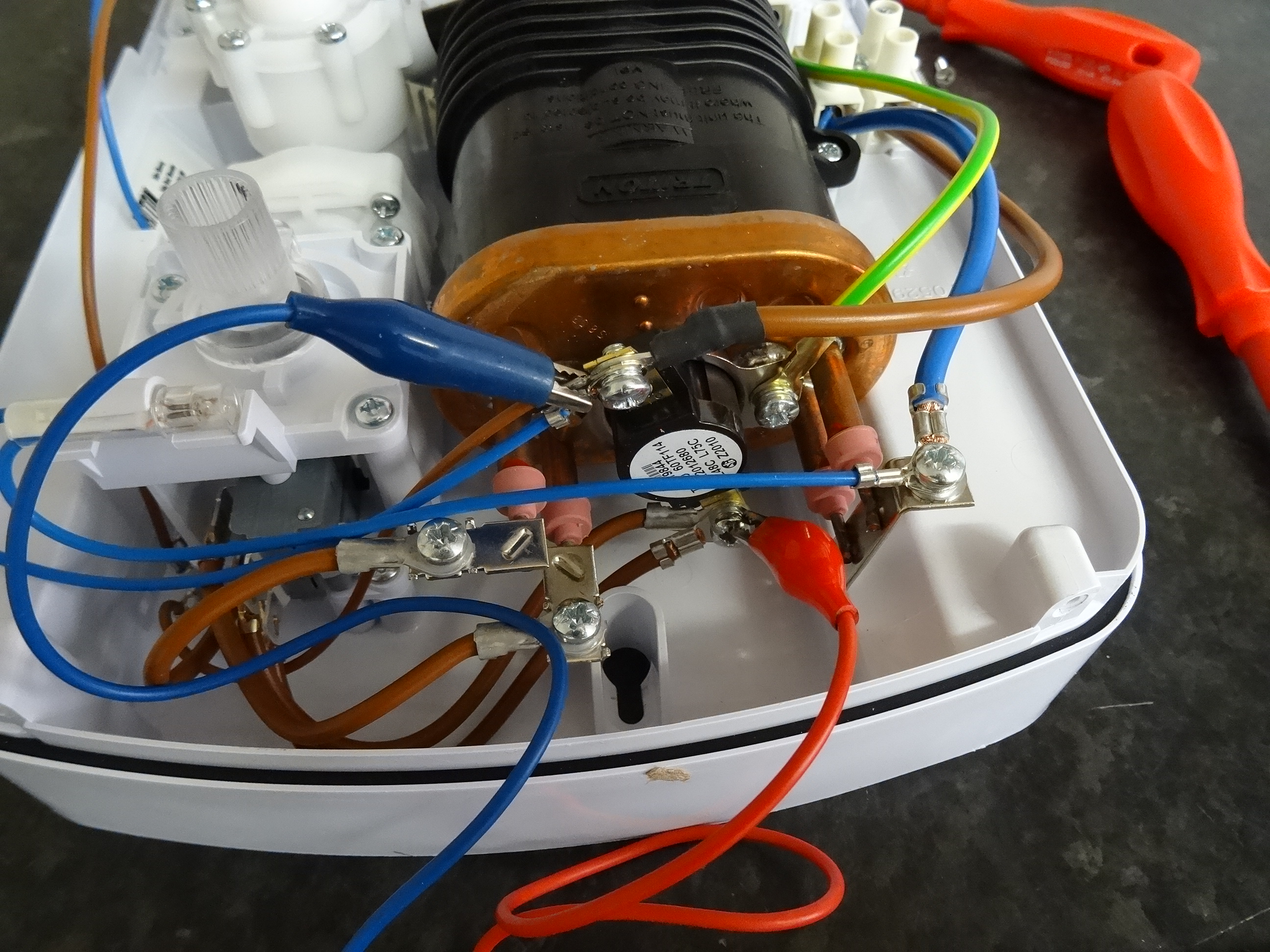 Electrical shower fault finding and repair Electric shower thermal cut out testing and