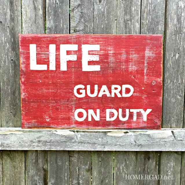 Lifeguard on Duty Sign with distressed lettering