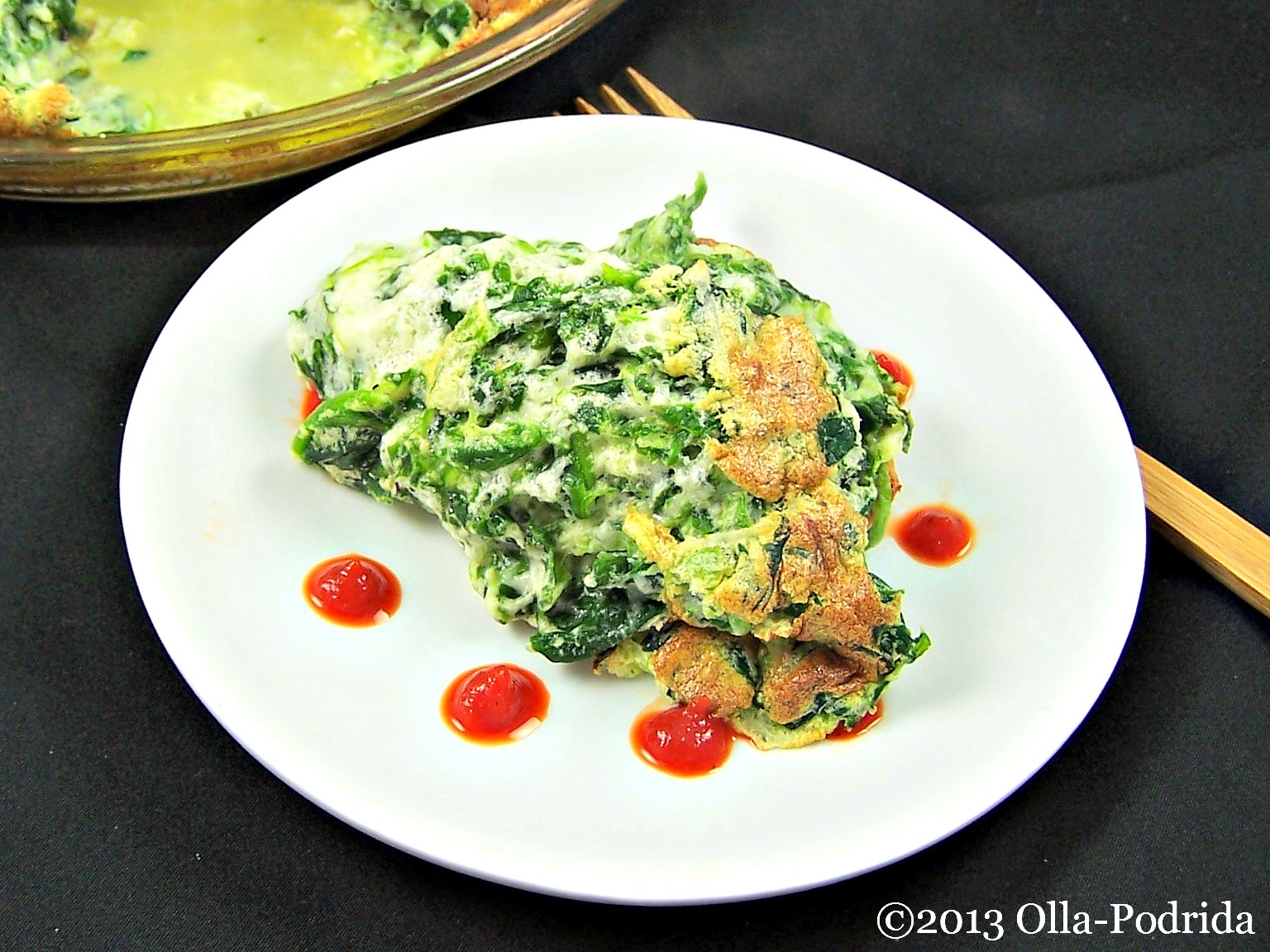 OllaPodrida Spinach Soufflé with Roasted Red Pepper Sauce