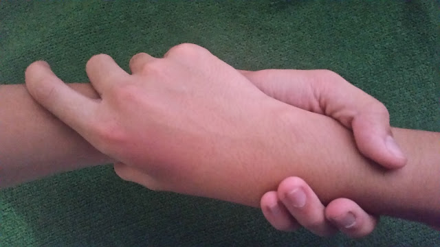 Two hand that holds together to show a friendship sign