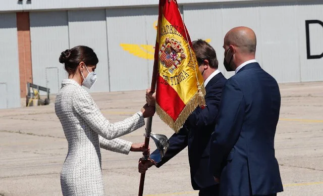 Queen Letizia wore a dress by Felipe Varela for baptism ceremony of Princess Leonor. Carolina Herrera authentic handbag