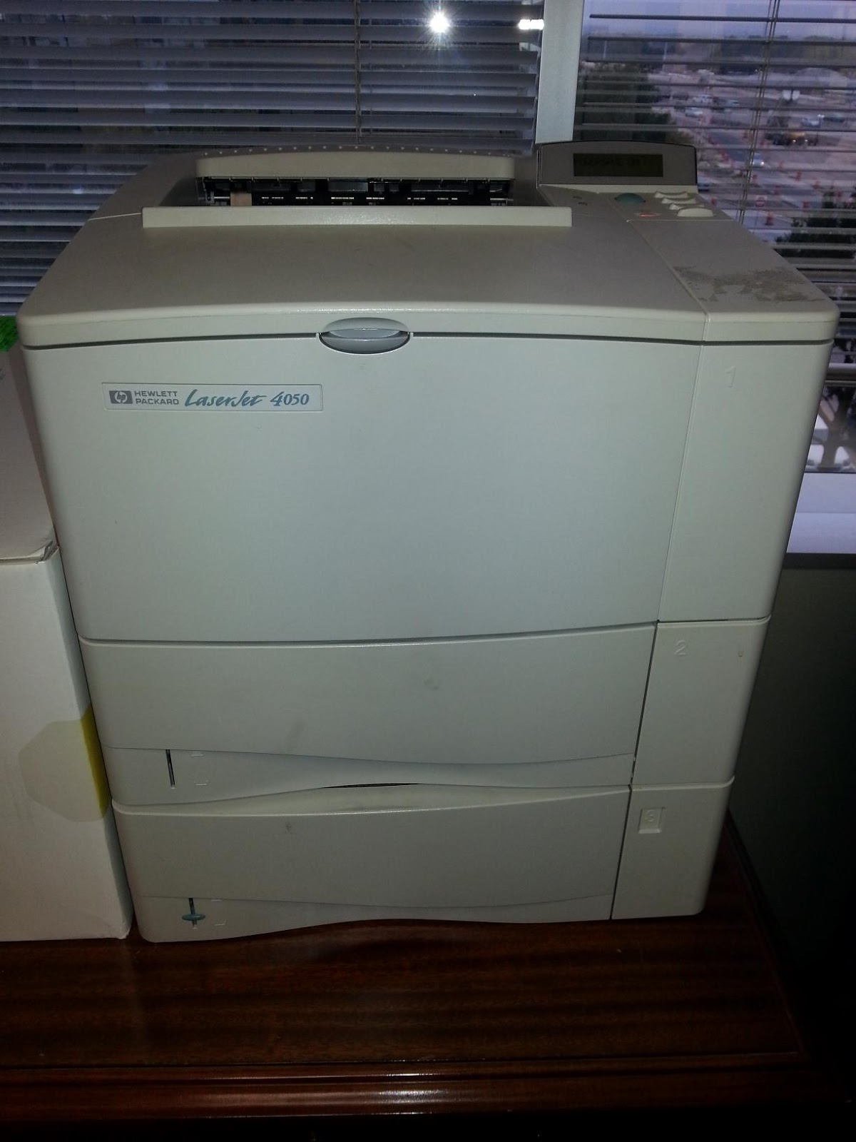 How to print a network configuration page Hewlett Packard Laserjet 4050