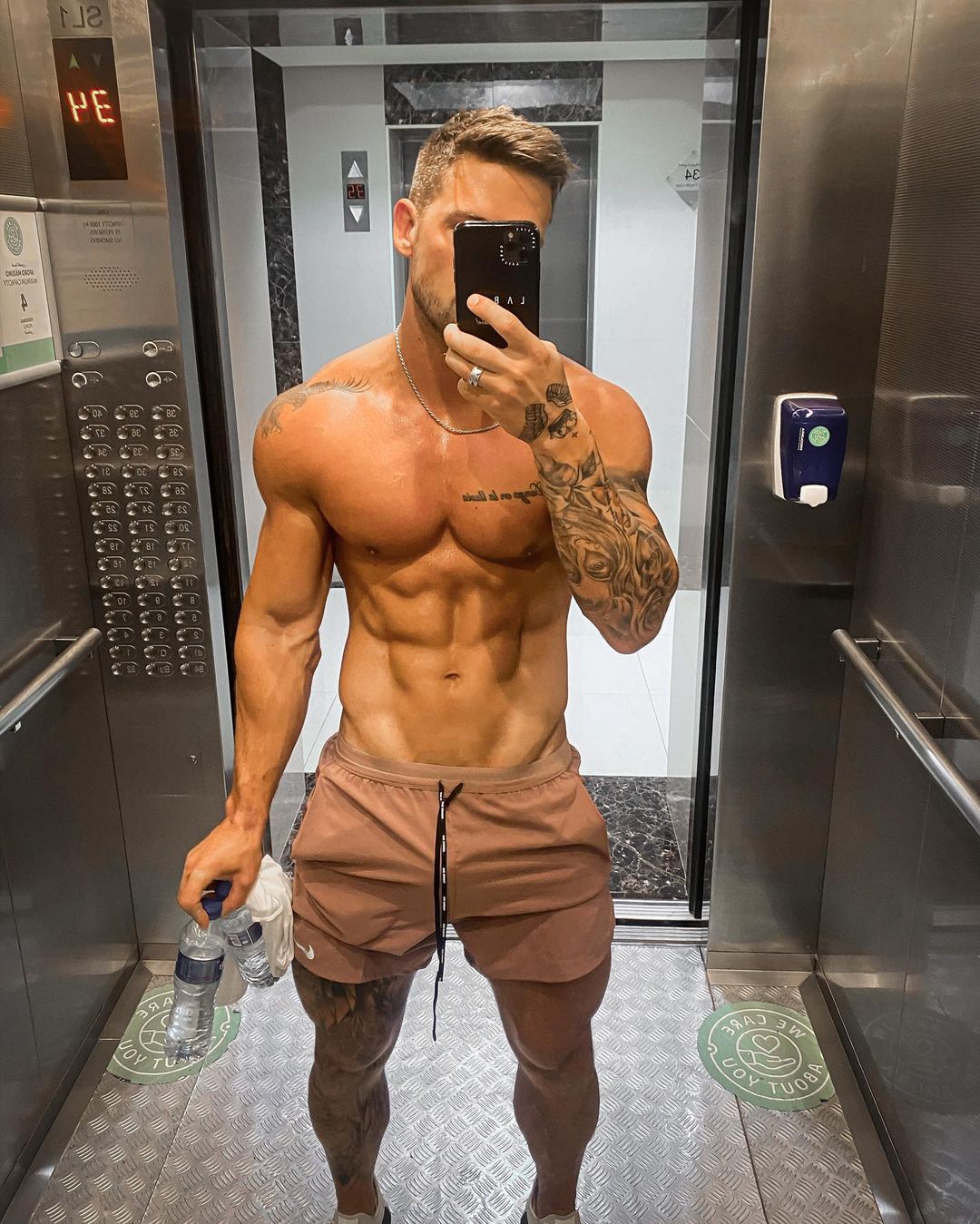 sexy-shirtless-ripped-elevator-hunk-joss-mooney-fit-straight-guys-abs-water-bottles-drinking