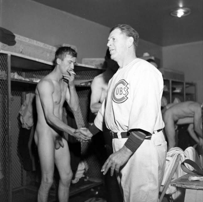 Congratulating a player in the Cubs locker room. 