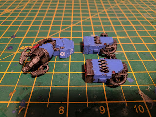 Three attachments for space marine dreadnoughts painted in the livery of the Ultramarines