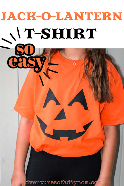 orange t-shirt with black jack-o-lantern face