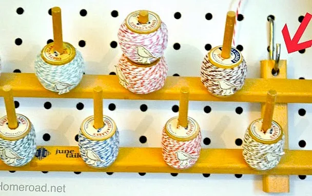 craft room organization for twine on a pegboard