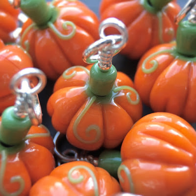Handmade lampwork glass pumpkin beads by Laura Sparling