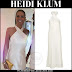 Heidi Klum in white silk halterneck dress on August 2