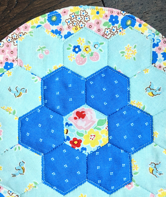 Elea Lutz's Bluebirds on Roses EPP Hexagon Breakfast Placemats sewn by Heidi Staples of Fabric Mutt for Riley Blake Designs