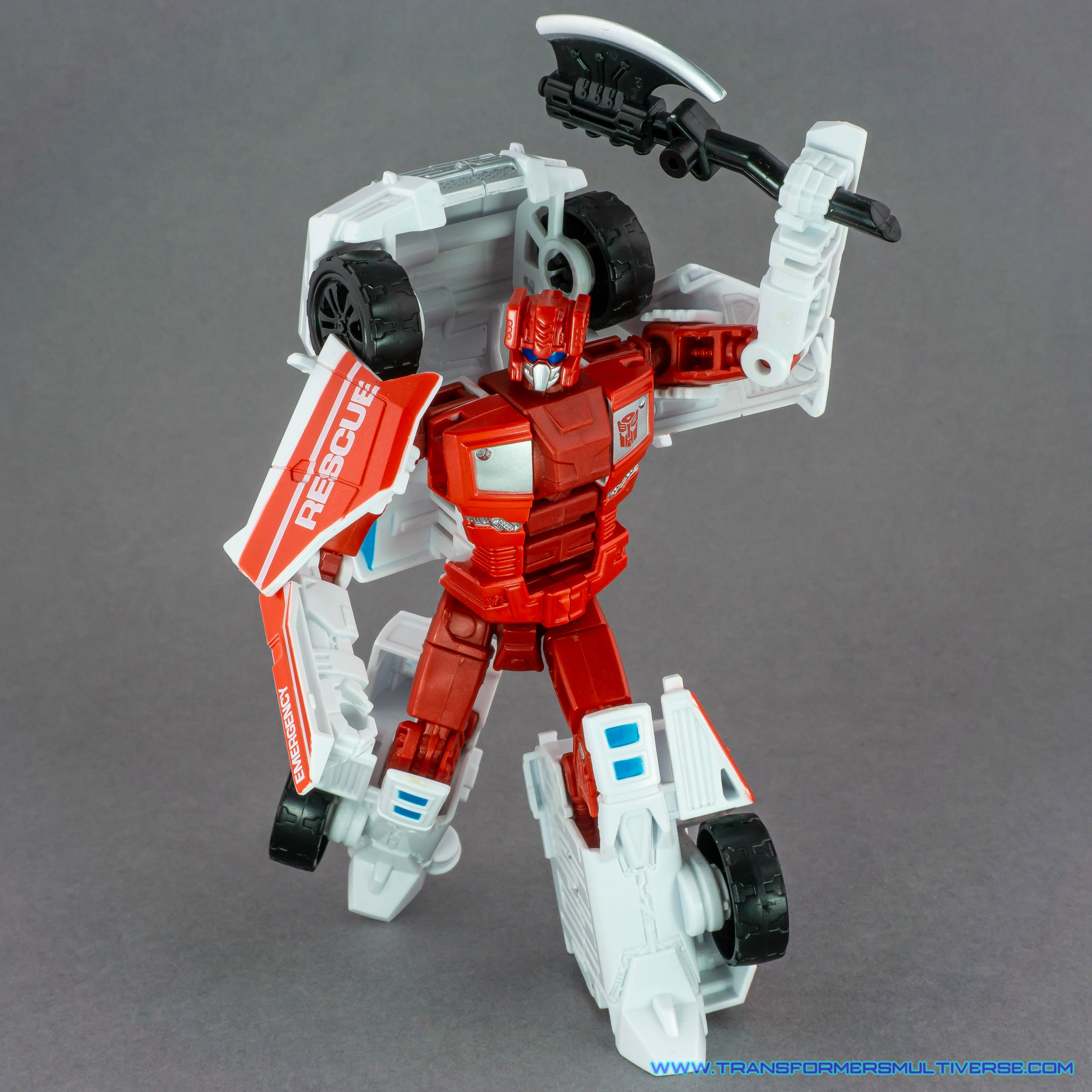 Transformers Combiner Wars First Aid with axe, posed