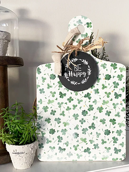 St. Patrick's Day mantel with decoupaged cutting board sign