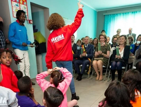 Queen Mathilde of Belgium visited the Fernand Philippe Maternal Home in Wanfercée-Baulet. The Queen wore Natan green dress