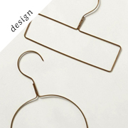 Display-Worthy Clothes Hangers | Remodelista