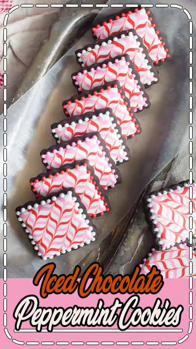 These Dark Chocolate Peppermint Sugar Cookie Cut-Outs are Decorated with Pink and Red Candy Cane Stripes of Royal Icing! Follow my Video Tutorial and enjoy this Fun and Festive Holiday Recipe.