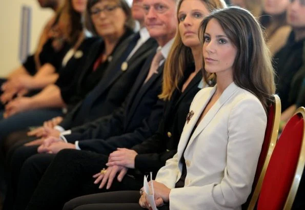 Princess Marie arrived at the fair with the Rector of the University of Southern Denmark. wore blazer and black trousers, diamond earrings