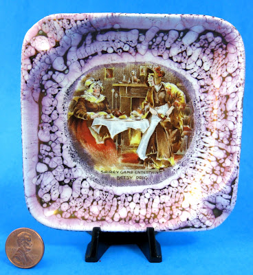 https://timewasantiques.net/products/sairey-gamp-dickens-pink-luster-ashtray-lancaster-1940s-trinket-dickensware?_pos=1&_sid=91cc17960&_ss=r