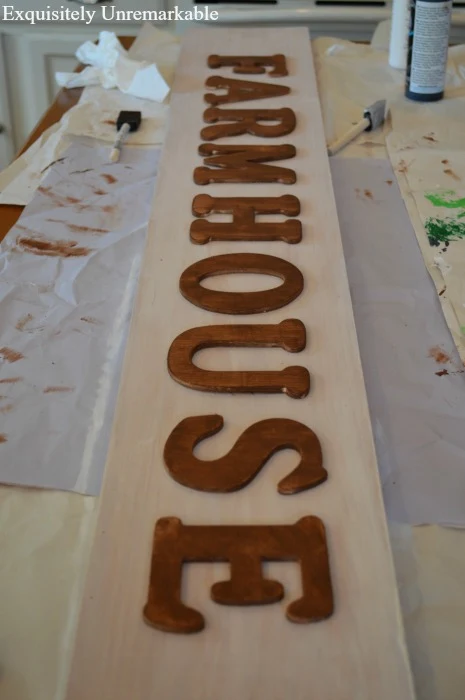 Paint wooden letters for a custom sign