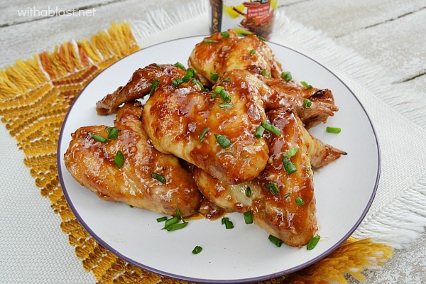 Sticky Honey Chicken wings are the BEST  saucy, honey baked Chicken wings ever - perfect Game Day snack or serve for dinner #StickyWings #HoneyChicken #HoneyWings #GameDaySnack #StickyChicken