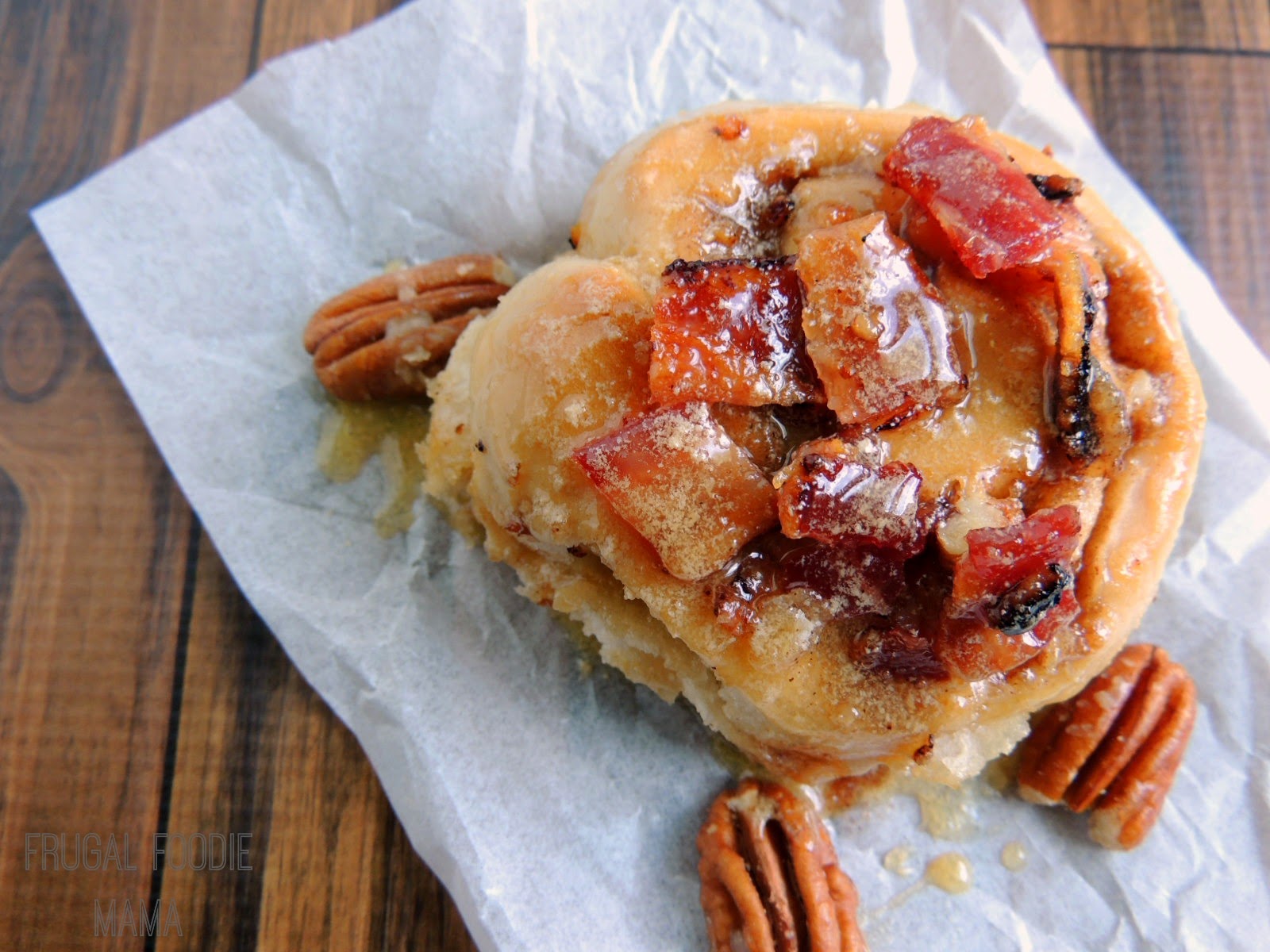 These Brown Sugar Glazed Bacon Butter Pecan Sweet Rolls start with a box of butter pecan cake mix, are filled with crunchy pecans, and are then topped with a sweet brown sugar glaze and salty bacon.