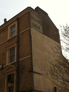 Ghost sign for The Royal Oak pub, now The Temperance, Enford Street, London W1