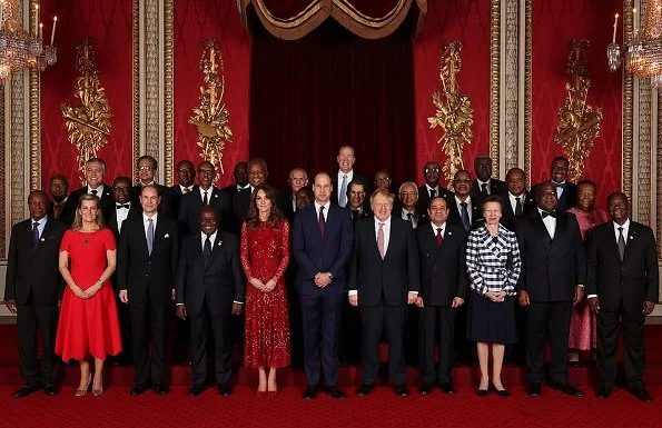 Kate Middleton wore a new red sequined tulle gown by Needle and Thread. The Countess of Wessex wore a stripe knit dress by Alaïa