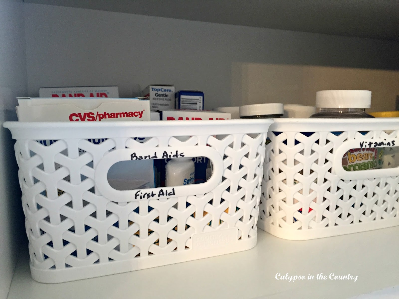 Kitchen Cabinet Organizing - Vitamin and First Aid Storage