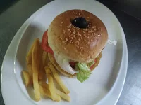 Serving veg burger (veggie burger) with french fries for veg burger(veggie burger) recipe