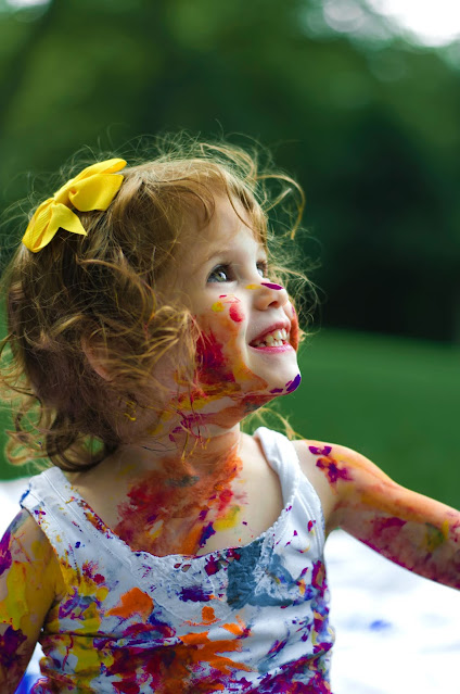 A girl with multiple colors on her showing the complexity of personality