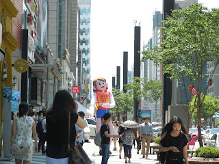 Skyscraper in Gangnam area with a huge doll in Seoul